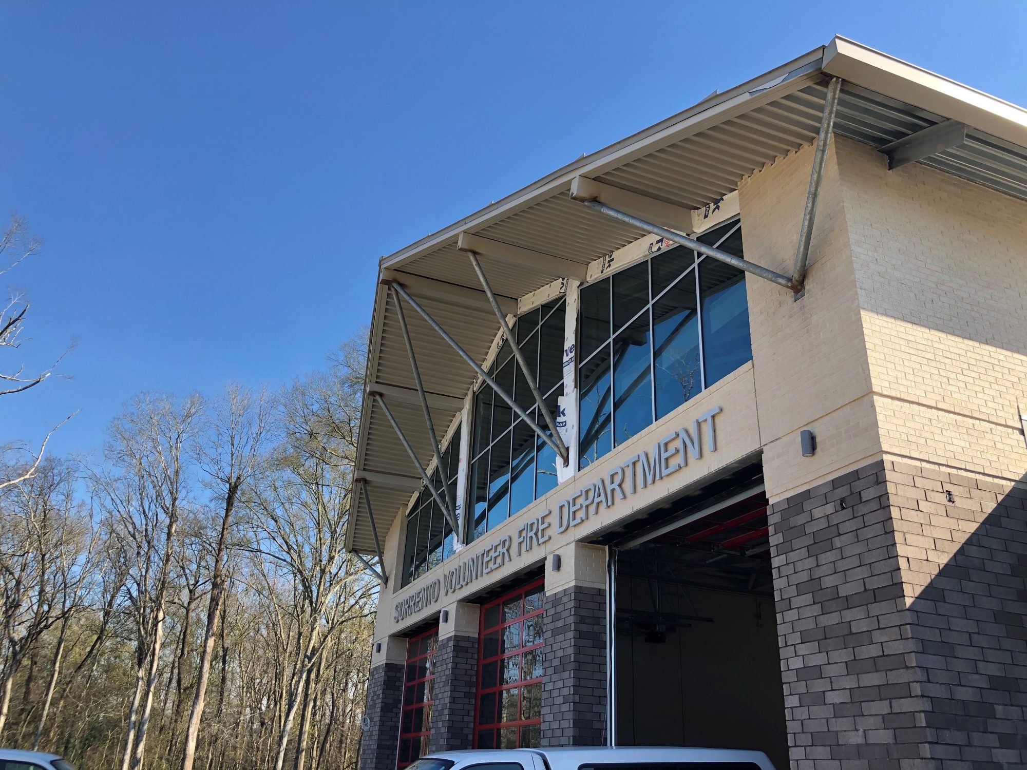 Exterior showing structural steel trusses and decking over engine bay entrance